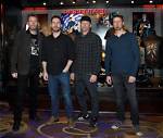 Uncover the Age of Nickelback's Leading Voice