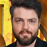 Uncover the Secrets of Tom Burke's Enduring Relationships
